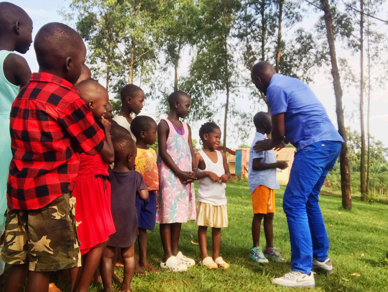 Children standing together showing kindness